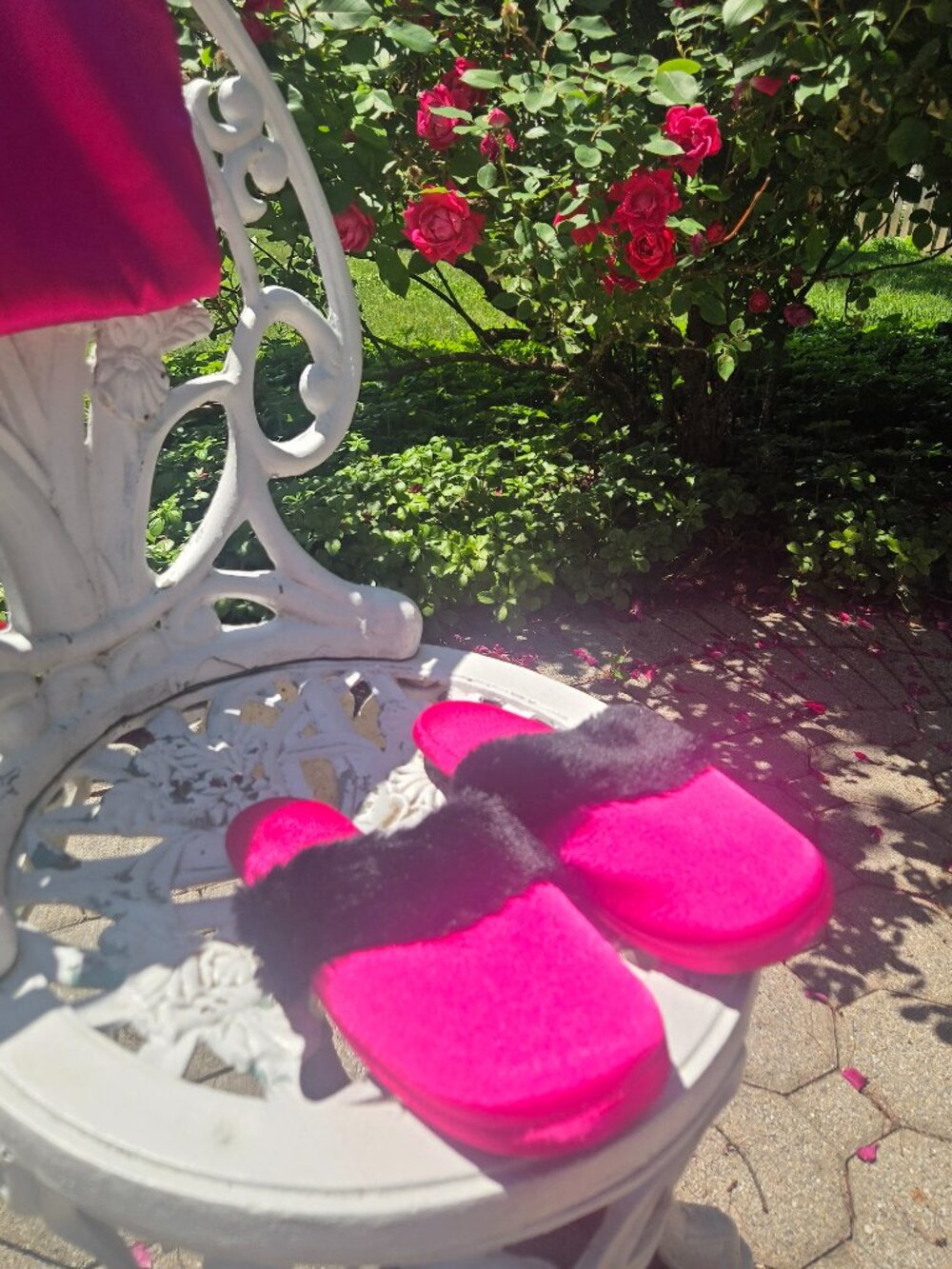 Hot pink satin house slippers with black fuzzy trim